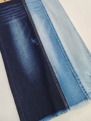 comprar Tejido denim de 8oz con hilo Siro de spandex débil, cruzado y con motas, construcción 12+12*21/40 para vaqueros o abrigo de denim online manufacture