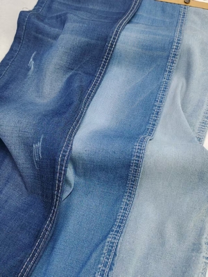 comprar 65% Tencel Estiramiento débil Twill Estilo 4.7 oz de peso ligero Tejido de denim para niños de verano Jeans o camiseta online manufacture