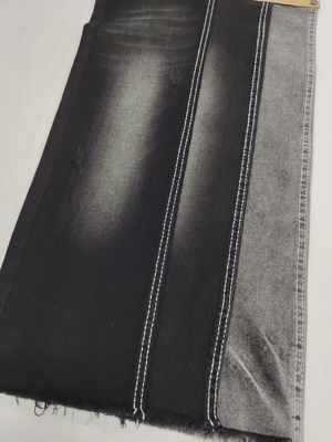 comprar 75% de algodón 8.3 oz de peso medio Twill estilo negro / negro estiramiento de denim tela 12S para mujer jeans online manufacture