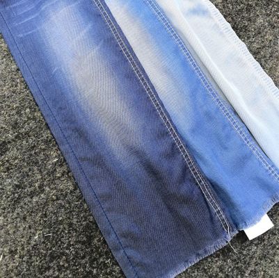 Estiramiento ligero Lycell Tencel Tejido de denim para el verano Lady Jeans pantalones o camisa
