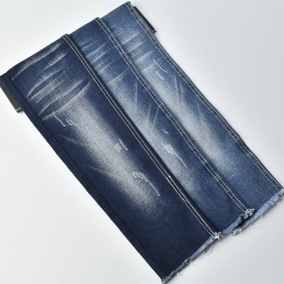 Tejido de denim resistente a la contracción de 10,5 oz de hilo de twill tejido teñido