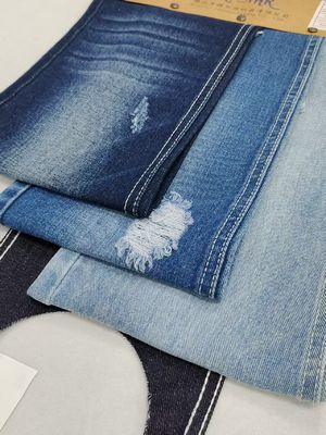 Estilo TWILL Poliéster de algodón 178-180cm Tejido de denim para mujeres de 9,3 oz Jeans